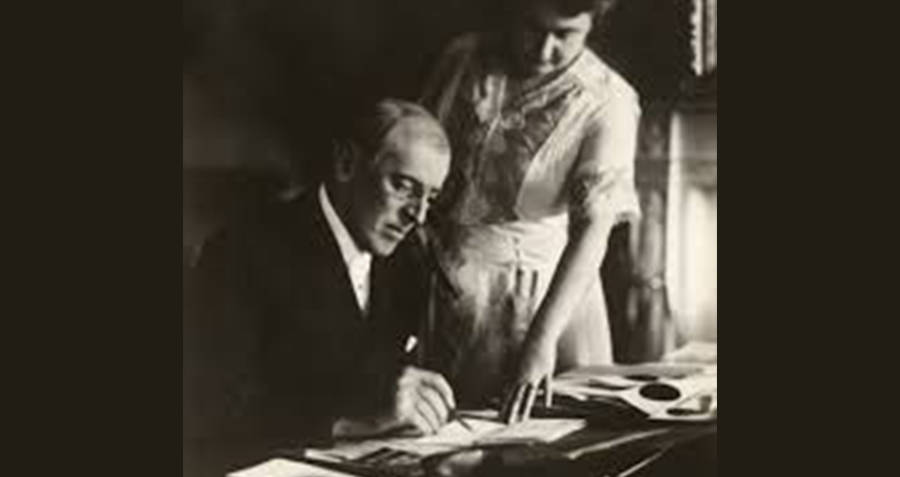 Edith And Woodrow Wilson Signing A Document